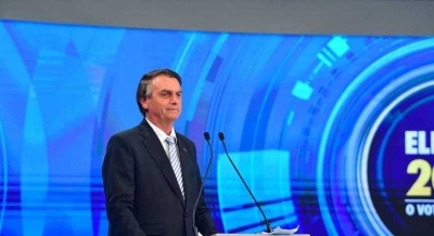 &#039;Quem atira em policial, bandido é&#039;, diz Bolsonaro sobre Roberto Jefferson